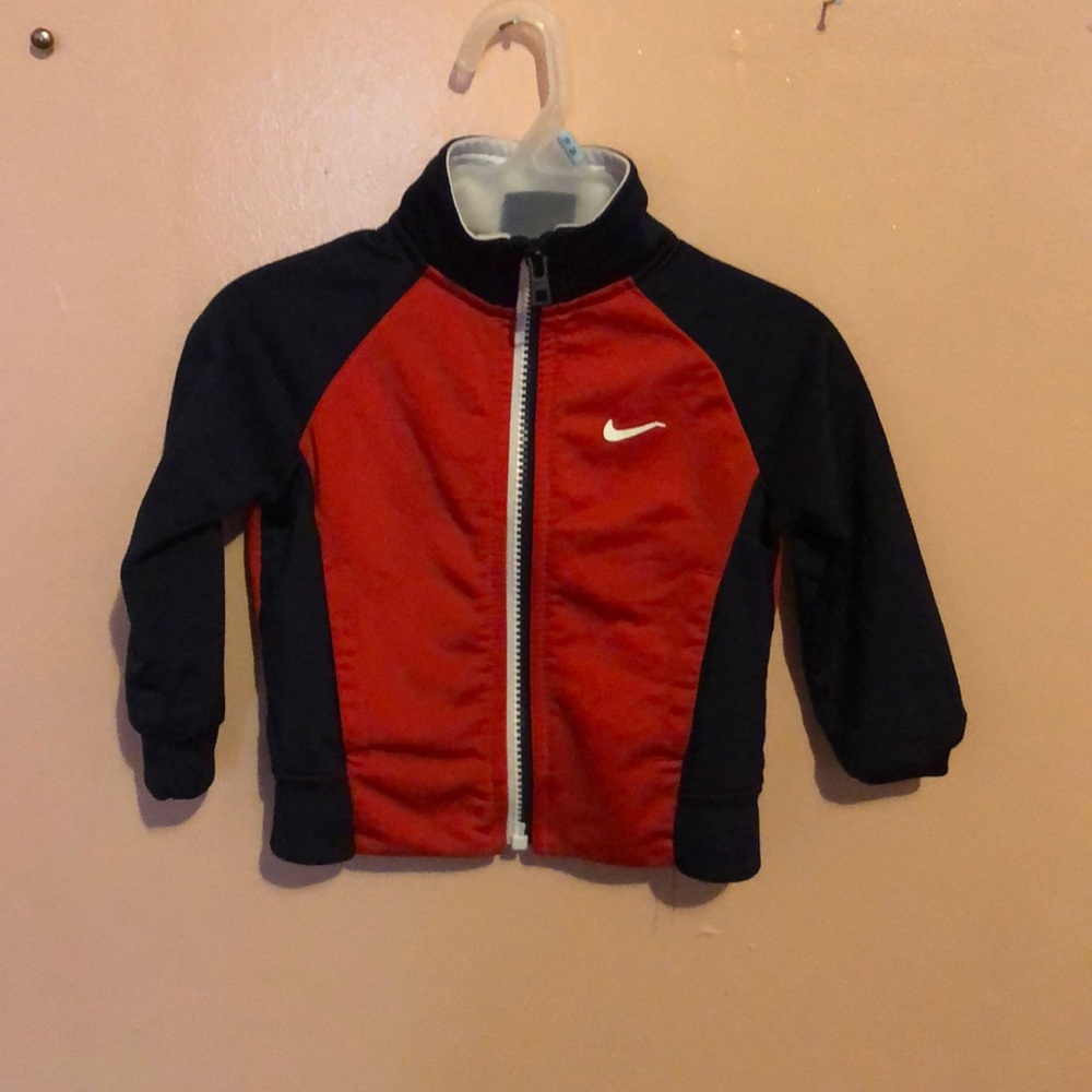 I am selling a red & blue Nike coat